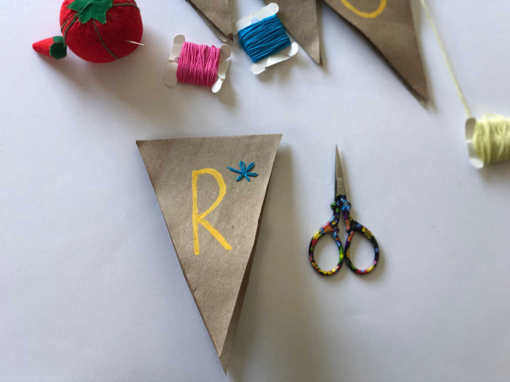 DIY toilet paper roll spring banner