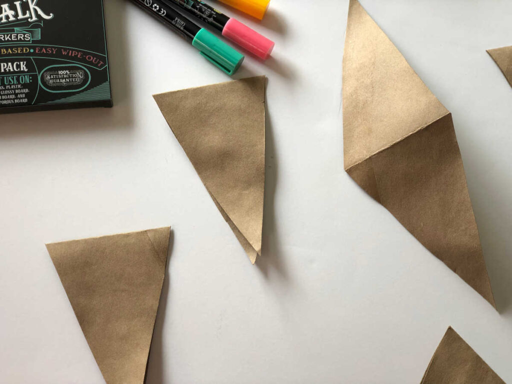 folded toilet paper rolls