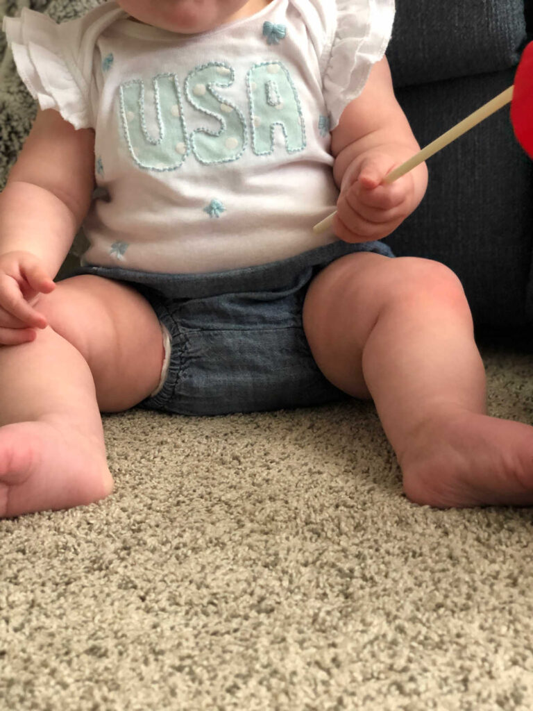 baby with USA reverse applique shirt
