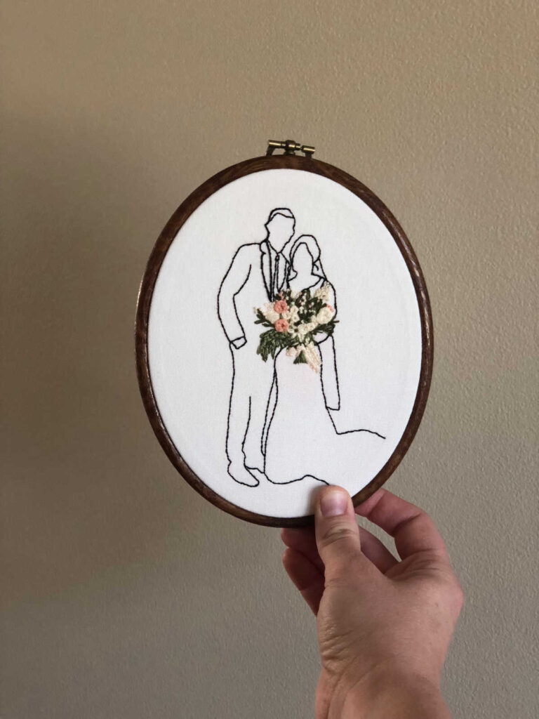 hand-embroidered bridal couple with flowers